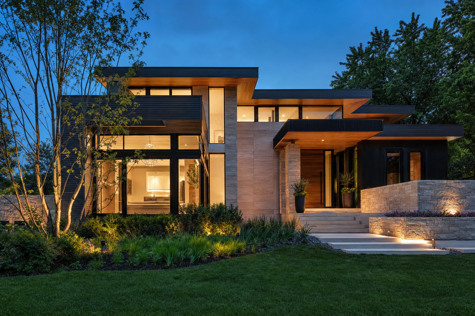 Modern multi-level home with warm wood and stone at blue hour